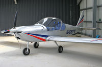 G-CEYY @ EGCW - Just about to be pushed out of the hangar prior to a local flight. - by MikeP