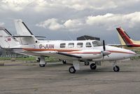 G-JUIN @ EGTC - Cessna T303 at Cranfield Airport, UK in 1988. - by Malcolm Clarke