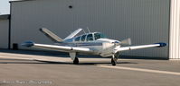 N9598R @ KFUL - 1959 Beech M35 - by Travis Taylor Photography