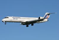 F-GRZB @ EGNT - Canadair CL-600-2C10 Regional Jet CRJ-702 on approach to rwy 25 at Newcastle Airport, UK. - by Malcolm Clarke