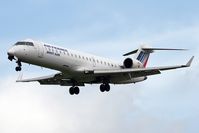 F-GRZE @ EGNT - Canadair CL-600-2C10 Regional Jet CRJ-702 on approach to rwy 07 at Newcastle Airport, UK. - by Malcolm Clarke
