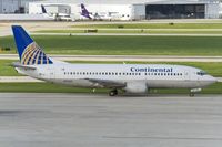 N17321 @ KSAT - taxying to its stand - by FBE
