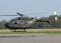 07-72012 @ DTN - Departing Downtown Shreveport heading back to Fort Polk, Louisiana. One of three UH-72's traveling together. Kinda odd the three helicopters registartion #'s were 2010, 2011, and 2012? All three in order, traveling together? - by paulp