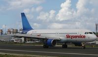 C-FZAZ @ TNCM - Making use of all there stopping power