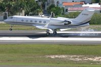 N702GH @ TNCM - american air services executive management jet jet speed