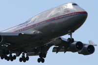 9M-MPO @ EGLL - Unusual light hitting this 747-400 on late finals. - by MikeP