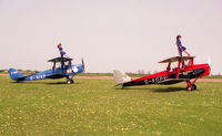 G-AGPK @ EGTC - De Havilland DH-82A Tiger Moth II Built in 1945 and seen here with fellow wing-walking Moth G-AIXD at Cranfield Airport, UK. - by Malcolm Clarke