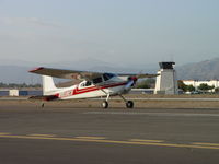 N919EH @ POC - Taxiing to 26L for take off - by Helicopterfriend
