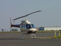 N90107 @ POC - Tied down waiting Pilot to be flown to own hanger - by Helicopterfriend