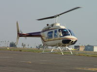 N90107 @ POC - Airbourne moving to taxi way of 26R for take off - by Helicopterfriend