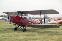 G-BJZF @ EGTC - De Havilland DH-82A Tiger Moth II at Cranfield Airport, UK. Later converted to an aerial sprayer. Seen at the 1994 PFA Rally. - by Malcolm Clarke