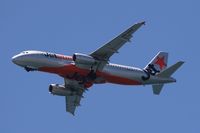 VH-VGZ @ YBMC - Jetstar Airbus lowering gear