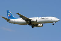 SX-BKT @ EGLL - Short final for Runway 09L at Heathrow. - by MikeP