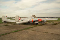J-1167 @ EGTC - De Havilland Vampire FB6 (DH-100). Ex Swiss Air Force J-1167, later renovated by the Vintage Aircraft Team at Cranfield to fly as G-MKVI. - by Malcolm Clarke