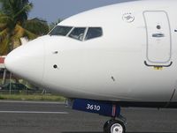 N310DE @ TNCM - a close up of the forward section