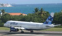 N561JB @ TNCM - Jet blue just landed at tncm