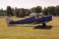 G-AESE @ WOBURN - De Havilland DH-87B Hornet Moth at the Famous Grouse DH Moth Rally 1989 held in the grounds of Woburn Abbey, UK. - by Malcolm Clarke