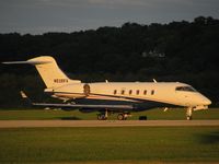 N525FX @ KLUK - Flexjet 525 taxiing by, lit by the setting sun - by Kevin Kuhn