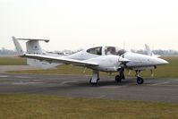 G-SELC @ EGTC - Diamond DA-42 Diamond Star at Cranfield Airport, UK in 2006. - by Malcolm Clarke