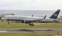 N942UW @ TNCM - Us Airways landing at tncm