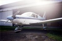 G-ATXM @ EGSG - Classic original PA-28 Cherokee seen in happier times.  - by GeoffW