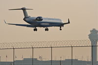 N521LR @ KORD - Mesa Airlines Canadair CL-600-2C10, ASH7257 arriving from KORF, short final 22R KORD. - by Mark Kalfas