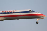 N825AE @ KORD - American Eagle EMB-135KL, EGF4190 arriving from KDSM, short final 22R KORD. - by Mark Kalfas