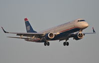 N957UW @ KORD - US AIRWAYS ERJ 190-100 IGW , AWE924 arriving from KCLT, short final 22R KORD. - by Mark Kalfas