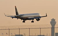 N957UW @ KORD - US AIRWAYS ERJ 190-100 IGW , AWE924 arriving from KCLT, short final 22R KORD. - by Mark Kalfas