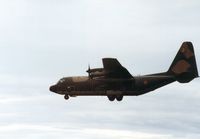CH-04 @ EGQS - C-130H Hercules of 20 Squadron Belgian Air Force landing at RAF Lossiemouth in the Summer of 1992. - by Peter Nicholson