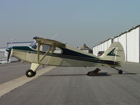 N2900Z @ CCB - Parked and providing shade for a friend - by Helicopterfriend