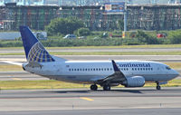 N16647 @ KEWR - A CO Boeing 737-500 sports her new Blended Winglets on a summer day at Newark International in 2009.  This aircraft was built in 1997. - by Daniel L. Berek