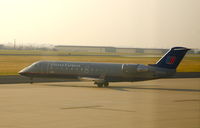 N915SW @ CID - Taxiing out of Landmark for runway 27 - hazy morning - by Glenn E. Chatfield