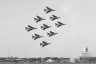 XM166 @ EGLF - English Electric Lightning F.1 XM166 leading the RAF formation team, 'The Tigers' at Farnborough in 1961 together with XM's 139, 140, 142, 143, 144, 146, 164 and 164. - by Malcolm Clarke