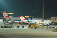 OE-LCQ @ VIE - Austrian arrows Canadair Regional Jet CRJ200LR - by Chris J