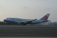 B-18215 @ KLAX - Touchdown 24R - by Nick Taylor Photography