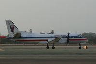 N390AE @ KLAX - Taxing to 24L - by Nick Taylor Photography