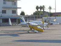N80WL @ KFUL - Transient parking at FUL - by Nick Taylor Photography