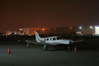 N383HP @ KLGB - Overnight at the Mercury FBO ramp - by Nick Taylor Photography