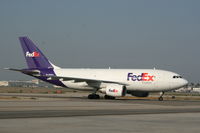 N409FE @ KLGB - Taxiing to parking - by Nick Taylor Photography