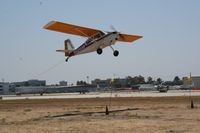 N626AP @ KLGB - Picking up a banner