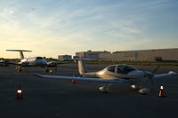 N764DS @ KLGB - Sitting on the Mercury ramp with N789LL - by Nick Taylor Photography