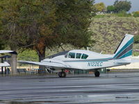 N122EC @ POC - Parked in Transient Parking in the rain - by Helicopterfriend