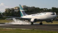 C-GMWJ @ TNCM - Canjet landing at runway 10 from Canada