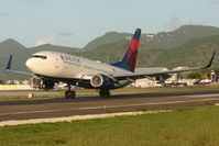 N307DQ @ TNCM - Delta airlines taking off at runway 28