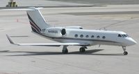 N498QS @ TNCM - Gulfstream N498QS taxing to A and will they will be holding short