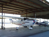 N7266W @ CCB - Sheltered and tied down - by Helicopterfriend