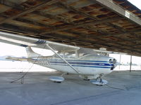 N8002K @ CCB - Sheltered, tied down and being worked on - by Helicopterfriend