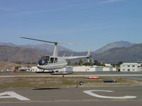 N543HK @ POC - Air taxiing to westside helipads - by Helicopterfriend