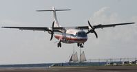 N417AT @ TNCM - American eagle landing at TNCM
